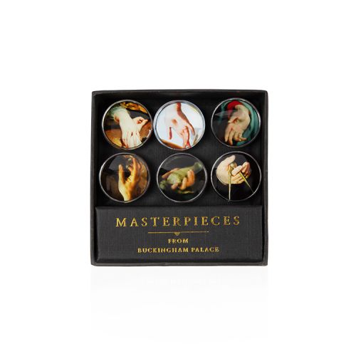 six circular glass magnets depicting paintings of hands