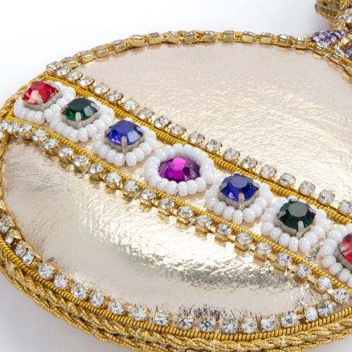 Front of golden orb Christmas decoration with cross and orb