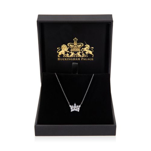 Silver chain with silver crown pendant decorated with crystals.