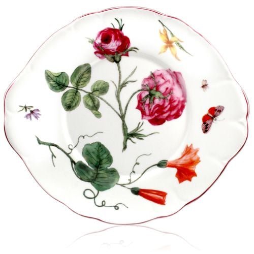 Chelsea Porcelain Salad plate on a table with flowers and other plates from the range. 
