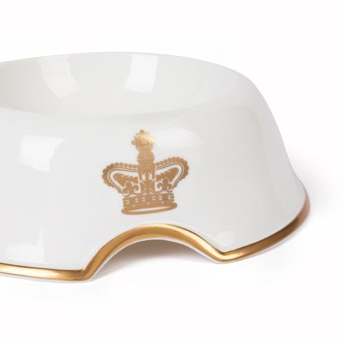 Front of pet bowl with gold edge and crown motif front and centre.