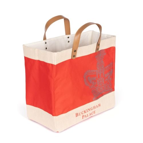 Red and natural jute bag with brown leather handles and Buckingham Palace Crown. 