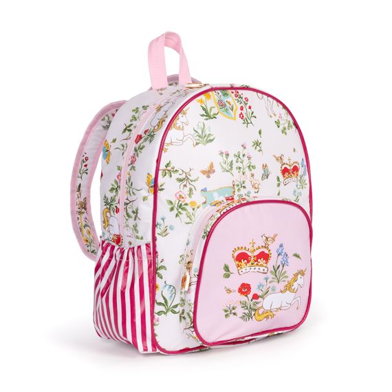 The pink children's backpack, with a floral pattern with a shield, unicorns and crown more with the floral symbols of the four British nations. Pink front pocket with detail of unicorn and royal crown. The pink children's backpack, with a floral pattern with a shield, unicorns and crown more with the floral symbols of the four British nations. Pink front pocket with detail of unicorn and royal crown.