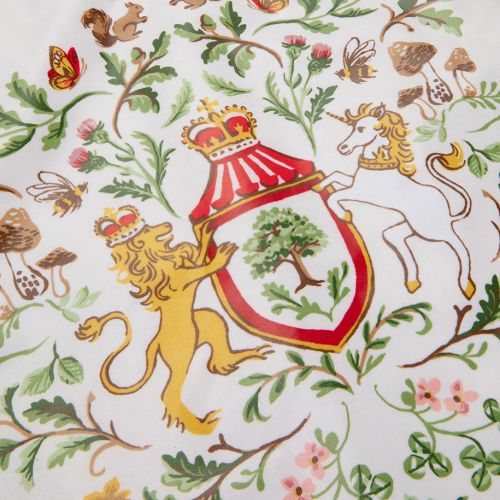 A drawstring bag featuring pastel green cord straps and with illsuatrion featuring the Royal Coat of Arms, surrounded with British wildflowers foliage, and garden wildlife such as birds, bees, and butterflies.