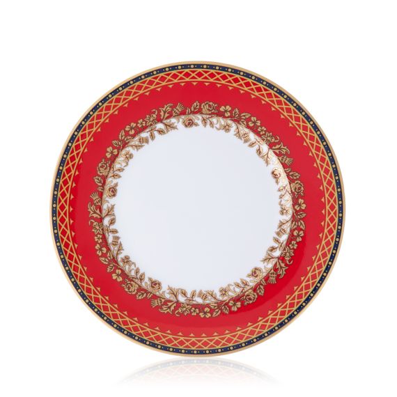 This Livery side plate features a deep, rich scarlet edge and navy border with contrasting fine gold details, inspired by the intricate decorative braiding of hand-sewn livery and regimental devices of ceremonial uniforms. The centre of the plate is white This Livery side plate features a deep, rich scarlet edge and navy border with contrasting fine gold details, inspired by the intricate decorative braiding of hand-sewn livery and regimental devices of ceremonial uniforms. The centre of the plate is white