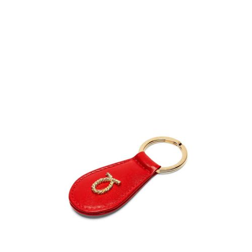Launer Red Keyfob with gold detailing.