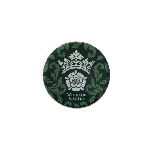 Round green magnet feauring Tudor Rose and crown. 