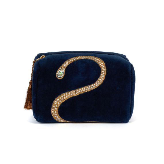 Blue velvet toiletries bag deaturing gem studded snake design. 