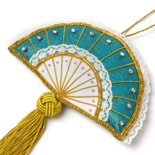 Eggshell blue fan christmas decoration finished with gold accents. 