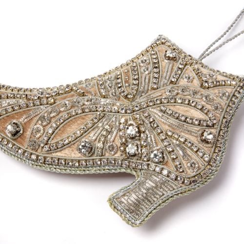 Crystal studded boot decoration with string. 
