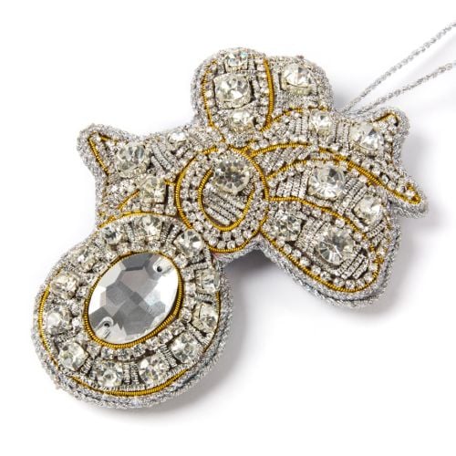 Glass crystal brooch decoration with silver string. 