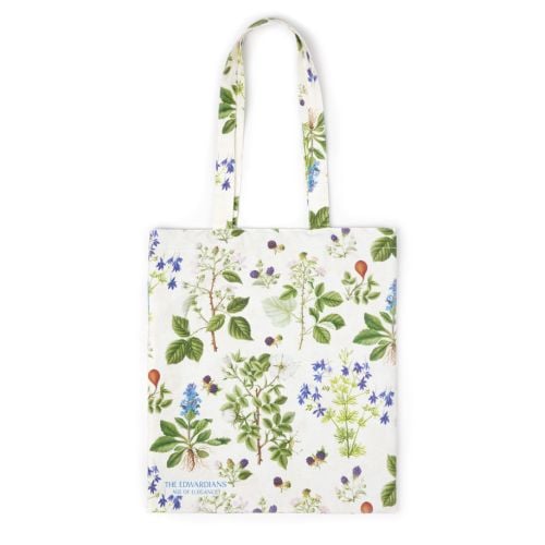 Floral design exhibition tote bag with Exhibition title printed in blue on bottom left corner. 