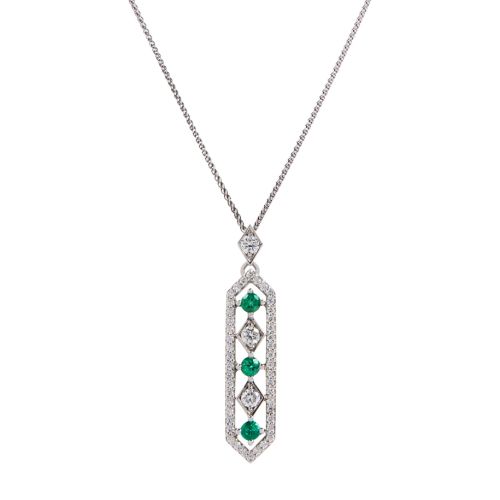 The Girls of Great Britain and Ireland Limited Edition Emerald and Platinum Pendant, featuring three emeralds. 
