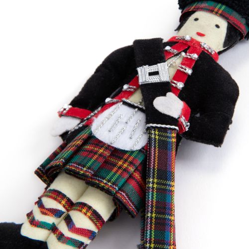 Fabric Scottish Piper Christmas Decoration Dressed in traditional attire.